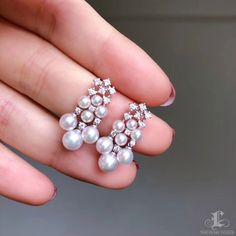 Highlight: Exquisite and Elegant Style Product Information OriginJapan MaterialAkoya Pearl, 18k Gold, and Diamond Dimensions2.0 x 1.1 cm Pearl Shaped: Round Size: 3-4.5 mm Quality: AAA Nacre: Very Thick Color: White Luster: Aurora Accessories Metal: 2.3 g of 18k White Gold Other: 0.42 ct of SI Quality Natural Diamond Including With Your Purchase: 30-Day Money-Back Guarantee Company Certificate Exquisite Gift Box Pearl Earrings Designs, Pearl Chandelier Earrings, Akoya Pearl Earrings, The Bling Ring, Diamond Earrings Design, Antique Gold Jewelry, Diamond Jewelry Designs, Pearl And Diamond Earrings, Jewelry Design Earrings