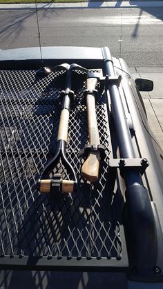 there are two large metal objects on the back of a truck's flatbed