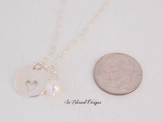 "Mother of the Groom, Mother of Bride gift, Mother in Law POEM, Heart cutout necklace, Sterling Silver charm, Wedding jewelry, mother in law This is such a great necklace for the Mother of the Groom. This is the sweetest sterling silver heart cutout necklace and the Mother in law saying goes so great with the necklace. I added a freshwater pearl to give it a timeless look. I'm also happy to change the wording on the card to make it for a Mother of the Bride. The insert card is printed on heavy c Wedding Heart Necklace With Birthstone In Sterling Silver, Sterling Silver Heart Necklace With Birthstone For Wedding, Delicate Heart Charm Necklace For Wedding, Wedding Sterling Silver Heart Necklace With Birthstone, Dainty Open Heart Charm Necklace For Weddings, White Heart Necklace For Wedding On Valentine's Day, Delicate Heart Charm Jewelry For Wedding, Silver Charm Necklace With Birthstone For Wedding, Silver Birthstone Charm Necklace For Weddings