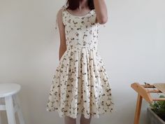 "Cream Tie Strap Cocktail Glass Print Dress - Canvas fabric - Invisible nylon zipper up back - Fixed waist - Fully lined - Pleated skirt - Ready to ship in 1-3 business days Measurements : Bust : 36\" Waist : 28\" Hips : free Length : 36.5\" Shoulder to waist : 15.5\" Model height : 5'6\" bust : 33\" waist : 25\" hips : 35\" Please read the policies tab before purchase. I can't have a model for clothes of all sizes, but I have already clearly written a model size. If you have questions about the Spring Sleeveless Stretch Cotton Dress, Fitted A-line Cotton Sundress, Stretch Cotton Sleeveless Dress For Spring, Stretch Cotton Sleeveless Dress For Summer, Beige Cotton Sundress, Cotton A-line Sundress Sleeveless, Fitted Cotton Sundress For Daywear, Fitted Cotton Midi Sundress, Fitted Cotton Sundress