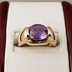 "\"Previously Loved, Not New\" Vintage Amethyst Ring, Featuring a Genuine Amethyst center (*Price of the ring is really gold only. The center is pretty scratched on the surface.*) This Genuine Purple Amethyst center stone is a checkered board cut oval shape. 14k Yellow Gold setting with 2 heavy bars. **Ring size: 6.25 **Amethyst is February's Birthstone, AND 2018 color of the year. This item can be sized up or down 2 sizes for an additional $30.00 Please feel free to contact me anytime, if you h Luxury 14k Gold Purple Rings, Luxury Purple 14k Gold Rings, Fine Jewelry 14k Gold Amethyst Ring With Round Cut, Classic Amethyst Ring Stamped 14k, Formal 14k Stamped Amethyst Ring, Purple Ruby Ring For Formal Occasions, Yellow Gold Amethyst Ring With Accent Stones, Round Cut, Yellow Gold Amethyst Ring With Round Cut Accent Stones, Oval Amethyst Diamond Ring In Yellow Gold