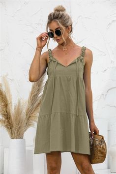 This summer tunic dress is perfect to dress up or down depending on your day. Easily pair this dress with your favorite leather sandals and summer accessories. MEASUREMENTS: Small - Chest & Waist: 35"-37"inMedium - Chest & Waist: 37"-39"inLarge - Chest & Waist: 39"-41"inXL- Chest & Waist: 41"-43"in Casual V-neck Sundress For Summer Outings, Chic V-neck Sundress For Summer Outings, Casual Sundress For Summer Day Out, Casual Summer Sundress For Day Out, Casual Midi Dress For Spring Outing, Casual Sundress For Summer, Casual Summer Sundress With Ruffles, Spring Sundress For Outing, Summer Fashion Sundress For Day Out