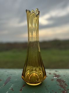 This LE Smith vintage vase is a stunning piece of hand-blown glass art. The vase has a unique root beer color with a glossy finish, and features a wide bottom with paneled and 8 fingered design. This original swung vase was manufactured in the mid-20th century (1956) and is a perfect addition for collectors of decorative vases or abstract art enthusiasts. This is a fun vase to add to your collection, it’s harder to come by and not seen often . The vase is perfect for all occasions and is ideal f Hand Blown Glass Art, Blown Glass Art, Decorative Vases, Vintage Vase, Vintage Vases, Root Beer, Hand Blown Glass, Vases Decor, Blown Glass