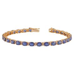 11.60 Carat Sapphire and Diamond Bracelet in 18K Gold This magnificent Oval shape sapphire tennis bracelet is incredulous. The solitaire Oval-shaped Oval-cut sapphires are beautifully With Single Diamonds making the bracelet more graceful and adding depth. Details of the piece: Diamond: 0.58 carats Sapphire: 11.60 carats Size - 6.75 Inch's Note: The width and size of the bracelet can be changed. This piece can be made in any color of gold. Sapphire Tennis Bracelet, Tennis Bracelet, Link Bracelets, Oval Shape, Diamond Bracelet, 18k Gold, Jewelry Bracelets, Tennis, Sapphire