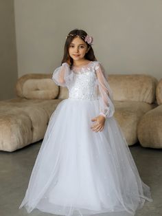 "White Lace First Communion dress with long puffy sleeves and full tulle skirt, Flower Girl Dress, Wedding guest tulle dress, Baptism gown, Junior Bridesmaid dress.  2501-16-L - handmade white lace communion dress has trendy design and will be perfect outfit for your special occasion date - holy communion and baptism, wedding, flower girl or Junior Bridesmaid, photoshoot, fairy & princess Item material: upper layer of the skirt - satin and tulle, lace middle layer of the skirt - tulle   lower layer of the skirt - taffeta corset - satin, tulle, lace, taffeta, zipper Item color: white, off white, ivory, blush Size: 2-3-4-5-6-7-8-9-10-12-13-Custom Size The size chart is the picture of the listing. If your measurements do not match to those specified in the standard size chart, we can combine Designer First Communion Dresses, Flower Girl Dresses White, Communion Dresses Lace, First Holy Communion Dresses, Flower Girl Dress White, Bridesmaid Photoshoot, Holy Communion Dresses, Skirt Satin, Skirt Tulle