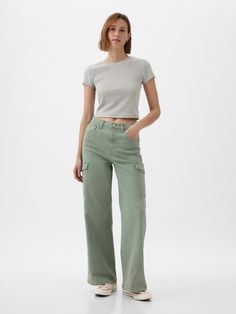 Fit: Fitted in the waist & hips with an ankle-length, relaxed wide leg.  Size down for a slimmer fit.  Fabric: 99% Cotton, 1% Stretch.  Stretch: Low Stretch Jeans.  Our most comfortable authentic denim.  Holds you in at the hips & waist but feels easy everywhere else.  Rise: High Rise Jeans.  Look: A loose cargo jean in a sage green wash.  Details: Zip fly, five-pocket styling, & cargo pockets at sides.  Responsibly Made: This pair of jeans is part of our water-saving Washwell program.  Compared Casual Cropped Flare Jeans For Everyday, Casual Cropped Flare Jeans With Five Pockets, Casual Cropped Bottoms For Everyday, Casual Cropped Wide Leg Pants For Fall, Casual Cropped Leg Cargo Jeans For Fall, Casual Cropped Flare Jeans, Casual Gap Flare Jeans For Fall, Everyday Wide Leg Cargo Jeans For Spring, Spring Wide-leg Cargo Jeans For Everyday