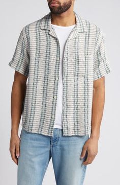 A mesmerizing plaid pattern in neutral hues enhances the versatility of a short-sleeve button-up shirt cut from soft cotton. 26 1/2" length; 42" chest (size Medium) Front button closure Notched collar Short sleeves Chest patch pocket 100% cotton hand wash, dry flat Imported Men Home Decor, Seersucker Shorts, Mens Short Sleeve Shirt, Mens Plaid, Plaid Shorts, Notched Collar, Short Sleeve Button Up, Fabric Gifts, Cut Shirts