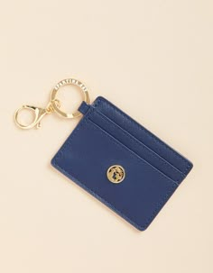 Keys & cards? There's no better way to keep them together than with this simply chic cardholder a la keychain. Open the magnetic snap closure for access to 6 card slots. Designed with a printed vinyl, this little lovely is a utilitarian powerhouse. Women's Navy Key Chain Card Holder in Blue by Spartina 449 Card Holder Wallet Keychain, Cute Keychains For Car Keys, Car Keychain Ideas, Key Chain Wallet, Keychain Pouch, Wallet Keychain, Vinyl Exterior, Things I Wanna Buy, Keychain Ideas