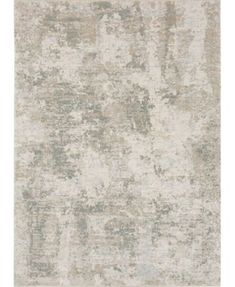 an area rug with faded paint on it