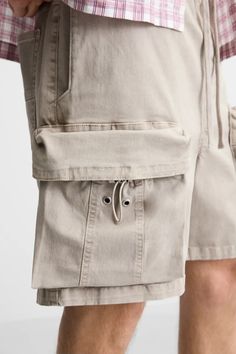 WASHED CARGO SHORTS - Stone | ZARA United States Casual Relaxed Fit Cargo Pants With Built-in Shorts, Utility Bermuda Bottoms With Built-in Shorts, Utility Shorts With Drawstring For Streetwear, Utility Style Drawstring Shorts For Streetwear, Utility Drawstring Shorts For Streetwear, Utility Bermuda Shorts With Built-in Shorts, Zara Cotton Bottoms With Built-in Shorts, Streetwear Drawstring Cargo Shorts, Drawstring Cargo Shorts For Streetwear