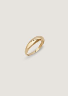 Inspired by Jennie's great grandmother's wedding band, this is a signature timeless piece you'll wear for every occasion. Her soft curves are bold, yet elegant enough to be worn day to night. Make her your trademark. To add a custom engraving on the inside of the band, visit HERE.If you're looking for a hollow version, shop the Dare to Love Dome Ring I. We recommend sizing up by at least half a size if this ring is thicker than what you typically wear. 14k solid gold—alwaysSolid, non hollowWeigh Timeless Gold Dome Ring For Wedding, Minimalist Gold Dome Ring For Wedding, Wedding Dome Ring With Thick Band, Tarnish Resistant, Classic Gold Dome Ring, Timeless Gold Dome Ring, Dome Wedding Band, Dare To Love, The Dare, Love Dare