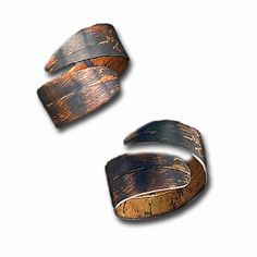 Elevate your style with this one-of-a-kind, boho copper ring! Crafted from recycled copper, it has been oxidized to a dark brown hue and coated with a protective finish to resist tarnish. With adjustable sizes between 6-10 and a width of 10mm at its widest and 3mm at its narrowest, you can take this bold piece on any adventure! Hypoallergenic and nickel-free, this remarkable ring will be the perfect addition to your collection. Brown Patina Jewelry For Gifts, Rustic Hand Wrapped Copper Jewelry, Brown Patina Jewelry Gift, Earthy Hand Forged Brown Jewelry, Rustic Brown Hammered Jewelry, Rustic Hand Forged Brown Jewelry, Handmade Hammered Bronze Copper Jewelry, Earthy Bronze Copper Jewelry, Unique Hand Forged Rust Jewelry