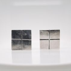 A very fine, three-piece Mexican silver modernist square cube clip-on earrings  and brooch.  By William Spratling.   With cube-shaped screw back earrings with screwbacks and a conformning cube-shaped brooch.     Simply a terrific parure from on of Mexico's jewerly masters!  Date: 20th Century  Overall Condition: It is in overall good, as-pictured, used estate condition. The three pieces have a wonderful, lived surface with some very fine & light surface scratches and other signs of expected ligh Modernist Rectangular Jewelry For Formal Occasions, Modern Hallmarked Clip-on Earrings For Formal Occasions, Modern Clip-on Earrings With Polished Finish, Modern Formal Clip-on Hallmarked Earrings, Contemporary Formal Jewelry With Rectangular Shape, Modern Rectangular Earrings For Anniversary, Contemporary Rectangular Jewelry For Formal Occasions, Contemporary Formal Rectangular Jewelry, Modernist Metal Earrings As Gift