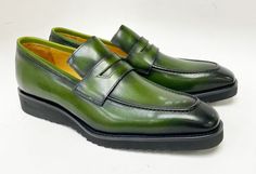 Calfskin Slip-On Penny Loafer Olive Gorgeous Calfskin slip-on Penny Loafer from our Exclusive Maurice collection features full Leather Lining, a clean welt and a tone on tone Lightweight Rubber Sole! Green Formal Slip-ons With Round Toe, Classic Green Leather Slip-ons, Green Slip-on Loafers, Green Dress Shoes With Rubber Sole For Office, Green Leather Sole Slip-on Loafers, Green Slip-on Moccasins For Business, Office Green Dress Shoes With Rubber Sole, Green Office Dress Shoes With Rubber Sole, Elegant Green Loafers For Business