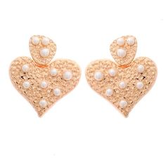 A matte gold textured brass hearts set with glass pearls, the Liza Pearl Heart Earring is modern whimsy with a touch of chic. This is the pair you'll want to wear on repeat! Size: one size. Gender: female. Age Group: adult. Gold Pearl Heart Earrings For Weddings, Elegant Metal Earrings With Heart Beads, Chic Gold Metal Heart Earrings, Chic Gold Heart Earrings For Wedding, Gold Pearl Heart Earrings, Gold Heart Beads Earrings For Party, Gold Earrings With Heart Beads For Party, Valentine's Day Gold Pearl Heart Earrings, Valentine's Day Gold Heart Pearl Earrings