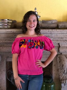 Beautiful Mexican top with floral embroidery, spring in the waist, neck and sleeves, hand embroidered by artisans from Oaxaca, Mx, it is a unique piece to make you look spectacular on any occasion. This blouse comes as a one size ideal for Small and Medium sizes. Blouse made by artisans from Oaxaca, Mx. Mexican textile art has centuries of history and creativity throughout the country. Mexico is recognized as one of the leading countries with a beautiful aristic production in the textile world, Casual Embroidered Top With Boho Collar For Spring, Bohemian Short Sleeve Tops For Spring, Spring Festival Floral Embroidered Top, Floral Embroidered Tops For Spring Festival, Spring Peasant Top With Floral Embroidery And Relaxed Fit, Spring Floral Embroidered Peasant Top With Relaxed Fit, Spring Floral Embroidery Peasant Top In Relaxed Fit, Pink Bohemian Relaxed Fit Blouse, Bohemian Embroidered Summer Top