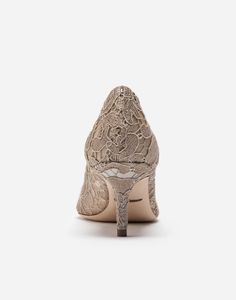 Featuring an iconic, timeless shape, these Bellucci pumps from the Rainbow collection come in lace. Feminine and elegant, they flaunt the iconic brooch made from colorful crystals that match the upper. Lace-covered mesh upper 60 mm - 2.4 inches heel Kidskin insole with branded label Branded leather sole Item comes with themed packaging Made in Italy Spring Wedding Shoes In Lace For Formal Occasion, Spring Formal Lace Wedding Shoes, Lace Heels With Pointed Toe For Formal Occasions, Elegant Low Heel Lace Wedding Shoes, Formal Lace Heels With Pointed Toe, Elegant Lace Wedding Shoes With Low Heel, Elegant Gold Wedding Shoes, Elegant Heels For Spring Ceremony, Lace Wedding Shoes With Pointed Toe