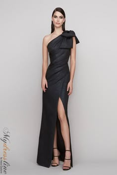 Looking for a show-stopping gown that will turn heads? The Frascara 4142 is perfect for making a statement. This one shoulder gown features a draped bodice with a large bow on the shoulder, fit and flare silhouette, and front side slit. Plus, it has a hidden back zipper and is satin lined for a luxurious feel. Made from 54% polyester, 23% cotton, 11% viscose, 10% polymetallic, and 2% other fibers, this gown is sure to make you look and feel your best. High Tea Dress, Cotillion Dresses, Dusty Blue Dress, Gala Outfits, Wedding Frocks, Black Gowns, Gala Outfit, Plastic Dress, Stunning Prom Dresses