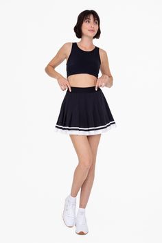 Crafted with perfect pleats, this tennis skirt features a contrast stripe trim in a high end grosgrain ribbon and built in undershorts with pockets for coverage and convivence.Kelsey is 5'9", a size 2, and is wearing an S100% recycled polyester Black Pleated Tennis Skirt For Sports, Sporty Summer Pleated Tennis Skirt, Fitted Sporty Tiered Skort, Sporty Fitted Tiered Skirt Skort, Sporty Fitted Tiered Skort, Sporty Pleated Shorts, Spring Sports Tennis Dress With Lined Skirt, Summer Sports Pleated Skirt, Short Pleated Tennis Skirt For Sports