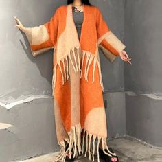 This super soft and warm wool cardigan kimono is perfect for the cold weather. Unlike other sweaters and wools, the wool used for this beauty is non itchy. Think of your favorite throw blanket, the comfort and warmth it gives but 10x stylish and wearable any where. This kimono is all that and more! One size fits S-4X Material: Wool One Size Fits Most Size Chart Oversized Acrylic Outerwear For Layering, One Size Knit Sweater Coat For Winter, One Size Winter Knit Sweater Coat, Acrylic Outerwear For Winter Layering, Winter Acrylic Outerwear For Layering, Winter Acrylic Cardigan For Layering, Casual Long Wool Sweater, One Size Trendy Winter Cardigan, One Size Soft Knit Cardigan For Winter