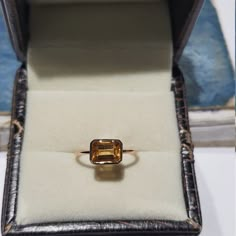 14k solid rose gold natural AAA quality emerald cut rectangular shaped citrine semi precious gemstone ring. 1. The weight of the natural citrine gemstone used in the ring =1.10 cts. 2. The weight of 14k solid rose gold used in the ring =1.130 grms. 3. The design of the ring is very nice and beautiful. 4. I have used all my skills and experience to manufacture this ring as beautiful as I can and I do hope my work will be appreciated. Thanks Yellow Gold Citrine Topaz Ring, Emerald Cut, Elegant Octagon Citrine Rings, Formal 14k Gold Emerald Rectangular Ring, Elegant Yellow Gold Rectangular Topaz Ring, Rectangular 14k Gold Emerald Ring As Gift, Gold Square Cut Emerald Ring With Gemstone, Rectangular Gold Emerald Ring, 14k Gold Rectangular Emerald Ring Gift, Gold Emerald Cut Topaz Ring