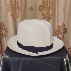 A Rare Find! Classic Handmade Finely Woven Straw Panana Hat From 1920's. Was In Storage All These Years And In Great Condition. Measures 22" On Inner Leather Band. Black Fabric Ribbon On Outside. Needs A New Appreciate Home, Enjoy! White Flat Brim Fedora For Formal Occasions, White Fitted Brimmed Panama Hat, Fitted Cream Panama Hat With Short Brim, White Panama Hat With Curved Brim For Formal Occasions, White Curved Brim Panama Hat For Formal Occasions, White Brimmed Fedora For Kentucky Derby, White Fitted Panama Hat With Curved Brim, Formal White Panama Hat With Curved Brim, Cream Fedora Panama Hat For Kentucky Derby