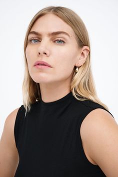 Modernism and minimalism collide in our Venus Drop Earrings. With a sleek profile and a reflective finish reminiscent of brilliant city lights, these sterling silver drop earrings are handcrafted to make your style shine day after day, night after night, season after season. Each pair includes a Marcella-branded vegan leather travel case for safe storage and easy travel.[SPLIT] Available in one size. Approximately .75” (2 cm) long. 18KT yellow gold plated brass. In silver, rhodium plated brass. Modern Linear Earrings For Everyday Wear, Minimalist Everyday Linear Earrings, Everyday Minimalist Linear Earrings, Minimalist Single Teardrop Earring For Formal Wear, Minimalist Single Teardrop Earring For Formal Occasions, Minimalist Single Teardrop Earring For Formal Events, Modern Sterling Silver Teardrop Earrings, Minimalist Linear Earrings For Formal Wear, Modern Everyday Drop Linear Earrings