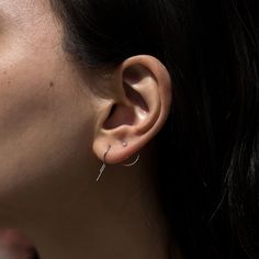 A charming little silver earring, clean and minimalist in design. Sold as singles.See Details for item specifics. Modern White Gold Cartilage Earrings, Modern White Gold Single Cartilage Earring, Minimalist Single Plug Earring For Everyday, Simple Huggie Cartilage Single Earring, Simple Single Huggie Cartilage Earring, Modern Small Hoop Piercings As A Gift, Modern Hypoallergenic Cartilage Earrings For Everyday Wear, Minimalist Single Hoop Plug Earring, Tiny Classic Cartilage Earrings For Everyday