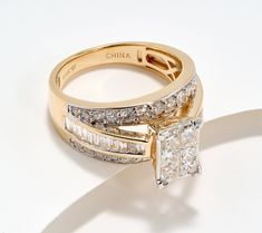 an engagement ring and wedding band set with princess cut diamonds in 18k yellow gold