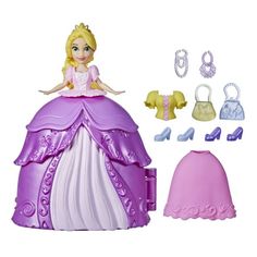 the doll is wearing a princess dress and accessories