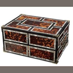 an ornate wooden box with metal trimmings