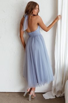 Shop the Andria Halterneck Tulle Midi Dress Blue | Selfie Leslie Spring Backless Midi Evening Dress, Spring Evening Backless Midi Dress, Backless Tulle Dress For Prom, Light Blue Knee-length Prom Dress, Blue Backless Midi Dress For Party, Blue Midi-length Backless Dress For Party, A-line Midi Dress For Wedding And Prom Season, Summer Tea Length Evening Dress For Wedding Guest, Midi Length Bridesmaid Dress For Prom Season