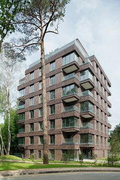 a tall brick building with lots of windows