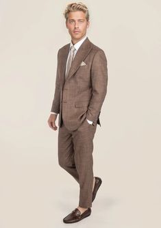 Be the best dressed at your next event with the Tawny Brown Hopsack Suit. This cool and stylish suit exudes elegance and luxury. Custom made from a luxurious bamboo/wool/linen/silk blend from Cavani, you're guaranteed to look as good as you feel. Dress to impress with this must-have suit. Luxury Linen Tweed Jacket With Notch Lapel, Luxury Linen Tweed Jacket For Business, Tailored Luxury Linen Blazer, Spring Business Suit With Concealed Placket, Luxury Tailored Linen Blazer, Luxury Linen Business Tweed Jacket, Elegant Linen Blazer With Concealed Placket, Brown Business Suits For Spring, Brown Semi-formal Suits For Spring