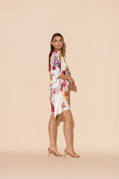 This is one Bouquet you won't want to throw away! Vibrant blooms of flora and fauna adorn this short caftan with tie waist in our signature Polysilk fabric. Dance the night away or lounge in luxe - the occasions are endless with this beautiful, blossoming statement piece. Machine washable for ease of care. Silk V-neck Summer Robe, Feminine Summer Kimono For Loungewear, Chic Spring Robe For Brunch, Feminine Summer Loungewear Kimono, Spring Beachwear Kimono For Brunch, Summer Daywear Dresses With Kimono Sleeves, Spring Kaftan With Kimono Sleeves For Loungewear, Spring Loungewear Kaftan With Kimono Sleeves, Spring Beach Cover-up Kaftan With Tie Waist