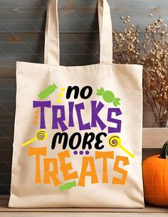 a white bag that says no tricks more treats