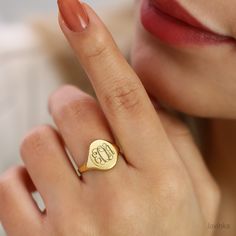 **Personalized Initial Signet Ring** Carry your style and story at your fingertips! Our personalized initial signet ring offers the perfect blend of elegance and meaning. Whether you're looking for a special accessory for yourself or a meaningful gift for a loved one, this ring is just what you need. **Features - **Personal Touch Customize your ring with your initials or those of your loved ones to make it uniquely yours. - **Quality Craftsmanship Each ring is crafted from carefully selected mat Stamped 14k Gold Engraved Ring Gift, Gold Rings Suitable For Gifts, Oval Monogram Engraved Ring As Gift, Gold Stamped Rings As A Gift, Oval Stamped Initial Ring For Gift, Personalized Rings As Gifts, Personalized Engraved Gold Ring, Gold Engraved Ring With Hallmarks As Gift, Personalized Gold Rings As Gift