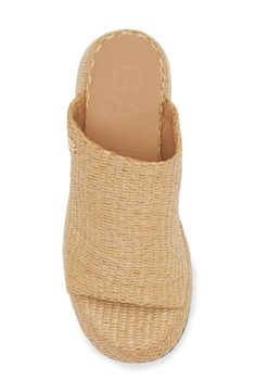 Woven raffia adds a boho-cool aesthetic to a slide sandal lofted by a chunky platform and sculptural block heel. 3 1/4" heel (size 39) Synthetic and textile upper and lining/synthetic sole Made in Portugal This brand has B Corp certification, representing business practices with emphasis on social and environmental performance, accountability and transparency
 This brand meets Nordstrom Responsible Brands criteria: brand adheres to responsible social and environmental practices Summer Platform Mules With Block Heel, Summer Mules With Platform And Block Heel, Modern Sandals With Block Heel For Beach, Modern Beach Sandals With Block Heel, Summer Synthetic Clogs With Stacked Heel, Modern Summer Clogs With Block Heel, Modern Clogs With Block Heel For Summer, Modern Block Heel Clogs For Summer, Summer Block Heel Mules In Natural Color