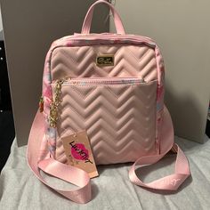 Betsey Johnson Quilted Blush Pink Backpack With Pullout Pouch With Chain Attached & Top Handle & Gold Accents Nwt , In Good Condition , No Holes , No Stains, No Scratches , No Scuff Marks Blush Pink Size--- 10 1/2" X 8 1/2" , 4 1/2" D Zip Closure Zip Pocket 2-- Slip Pockets Top Handle Gold Accents Pouch--- Zip Closure Adjustable Straps Luv Betsey Gold Charm Floral Design On Sides This Nice Pink Quilted Backpack With Pullout Pouch & Gold Accents Has Lots Of Room Great Gift For Any Occasion So Bri Cute Pink Backpack Shoulder Bag, Pink Everyday Shoulder Backpack, Pink Crossbody Backpack With Adjustable Strap, Pink Shoulder Bag Backpack With Adjustable Strap, Pink Crossbody Backpack For Daily Use, Trendy Rectangular Pink Backpack, Trendy Pink Rectangular Backpack, Cute Pink Bag With Zipper Closure, Trendy Pouch Backpack With Zipper Closure