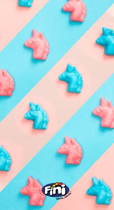 pink and blue pony cookies on a striped background