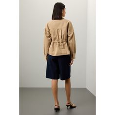 Brown twill (100% Cotton) Jacket. Collared. Long sleeves. Front button closure. 25" from shoulder to hemline. Imported.¬† Chic Collared Outerwear For Office, Chic Utility Jacket With Flap Pockets For Workwear, Beige Outerwear With Pockets For Office, Long Sleeve Utility Jacket For Office, Long Sleeve Utility Jacket With Pockets For Office, Office Utility Jacket With Pockets, Chic Lapel Collar Utility Jacket For Workwear, Chic Utility Jacket With Lapel Collar For Workwear, Chic Cotton Utility Jacket For Work