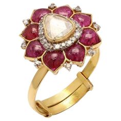 This exquisite ring is handcrafted in 18-karat gold. It is set in .80 carats ruby and .52 carats of sparkling diamonds. FOLLOW MEGHNA JEWELS storefront to view the latest collection & exclusive pieces. Meghna Jewels is proudly rated as a Top Seller on 1stDibs with 5-star customer reviews. All items manufactured by us are handmade and can be customized or redesigned. Certificate available upon request. Composition Gross Weight: 3.86 Grams Gold Net Weight: 3.57 Grams Ruby .80 carats Diamond Weight Luxury Red Diamond Ring With Single Cut Diamonds, Luxury Ruby Rings With Diamond Accents, Exquisite Ruby Ring With Brilliant Cut Diamond, Exquisite Brilliant-cut Ruby And Diamond Ring, Exquisite Ruby Ring With Diamond In Round Cut, Exquisite Ruby Ring With Diamond Round Cut, Exquisite Brilliant Cut Ruby Diamond Ring, Luxury Ruby Diamond Ring With Rose Cut Diamonds, Exquisite Ruby Rings With Diamond Accents