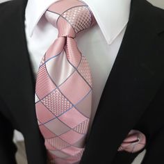 Look your best on your big day with our Pink Plaid Silk Tie Pocket Square Cufflink Set. Made from the finest silk, this set is perfect for formal wear, weddings and other special occasions. The pink plaid pattern adds a touch of elegance to any outfit, making you look and feel your best. 100% Silk Handmade Package Includes: Tie, Pocket Square & Cufflinks. Length: 59" Width: 3.34" Warm iron if needed Pink Plaid Pattern, Ben Silver, Cufflink Set, Neck Ties, Outfit Making, Pink Plaid, Tie And Pocket Square, Look Your Best, Pocket Square