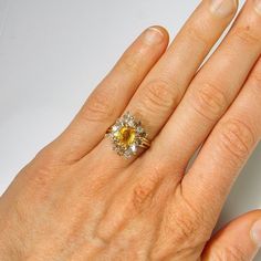 Yellow Sapphire Champagne Diamond Engagement Ring Sapphire Diamond Wedding Band Mid Century Engageme Yellow Diamond Ring For Wedding, Yellow Diamond Cluster Ring With Prong Setting, Elegant Yellow Sapphire Ring For Wedding, Elegant Yellow Cluster Ring As A Gift, Elegant Yellow Cluster Ring As Gift, Elegant Yellow Cluster Ring For Gifts, Yellow Sapphire Wedding Ring With Round Cut, Yellow Round Cut Sapphire Wedding Ring, Wedding Jewelry With Brilliant Cut Citrine