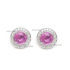 Pink sapphire diamond round cut earring studs gold | Natural pink sapphire halo diamond stud tops earrings gold | Pink sapphire stud gold GEMSTONE DETAILS : ✦ Gemstone : Pink Sapphire ✦ Gemstone Type : Natural ✦ Gemstone Size : 6 mm ✦ Gemstone Shape : Round ✦ Number of Gemstones : 2 ✦ Gemstone Weight : 2.35 Carats ✦ Gemstone Grade : AAA DIAMOND DETAILS : ✦ Diamond Type : Natural ✦ Diamond Size : 2.30 MM ✦ Diamond Color : F-G ✦ Diamond Clarity : Slightly included ✦ Diamond Cut : Excellent  ✦ Diamond Weight : 0.34 Carats METAL DETAILS : ✦ Metal : 14K/18K Gold ✦ Metal Color : Yellow / White / Rose Gold ✦ Setting : Flush Setting ✦ Ring Box : Yes SHIPPING DETAILS : ✦ Production time : 10-12 days ✦ Delivery time : 7-8 days ✦ Expedited shipping : Available ✦ Expedited shipping service : UPS ✦ Exp Emerald Cut Eternity Band, Emerald Eternity Band, Sapphire Eternity Band, Emerald Birthstone, Green Emerald Ring, White Gold Earrings Studs, Rainbow Sapphires, Emerald Ring Gold, Rainbow Gemstones