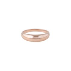 a rose gold wedding ring on a white background