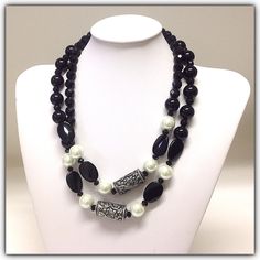 Black Stone and White Glass Pearls Necklace by gabrielation on Etsy Elegant Double Strand Beaded Necklace With Black Beads, Elegant Onyx Beads For Jewelry Making, Elegant Double Strand Beaded Necklace With Large Beads, Elegant Onyx Black Beads, Elegant Black Onyx Beads, Black Pearl Beaded Necklaces With Round Beads, Elegant Black Beaded Necklace With Silver Beads, Elegant Long Necklace With Large Beads, Black And White Round Bead Jewelry