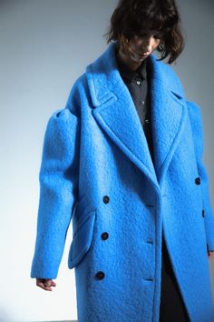 Drop-shoulder coat, virgin wool, sky blue. Crafted in soft alpaca and luxe virgin wool, this sky blue statement coat epitomizes femininity imbued with playfulness. Accented by pleated dropped-shoulders, it creates a fierce, unexpected silhouette. Chic Blue Wool Coat, Blue Wool Long Coat, Chic Blue Wool Coat For Winter, Chic Blue Wool Outerwear, Chic Blue Wool Coat For Fall, Drop Shoulder Coat, Blue Crafts, Statement Coat, Secret Sale