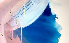 an abstract painting with blue, pink and gold colors on it's surface is shown