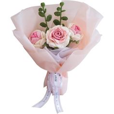 a bouquet of flowers with pink and white roses in it's wrapper on a white background